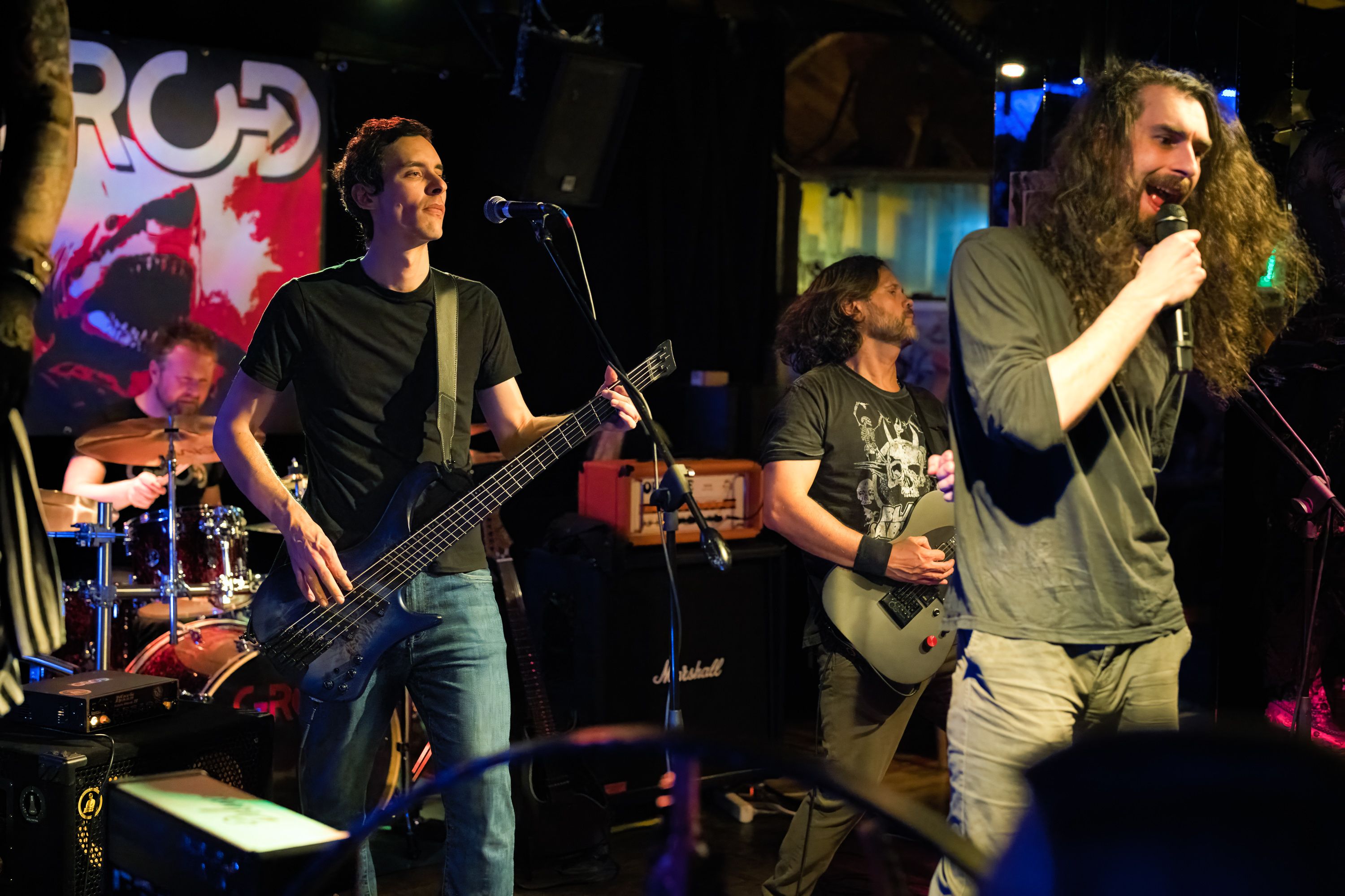 GROD performing live on stage.